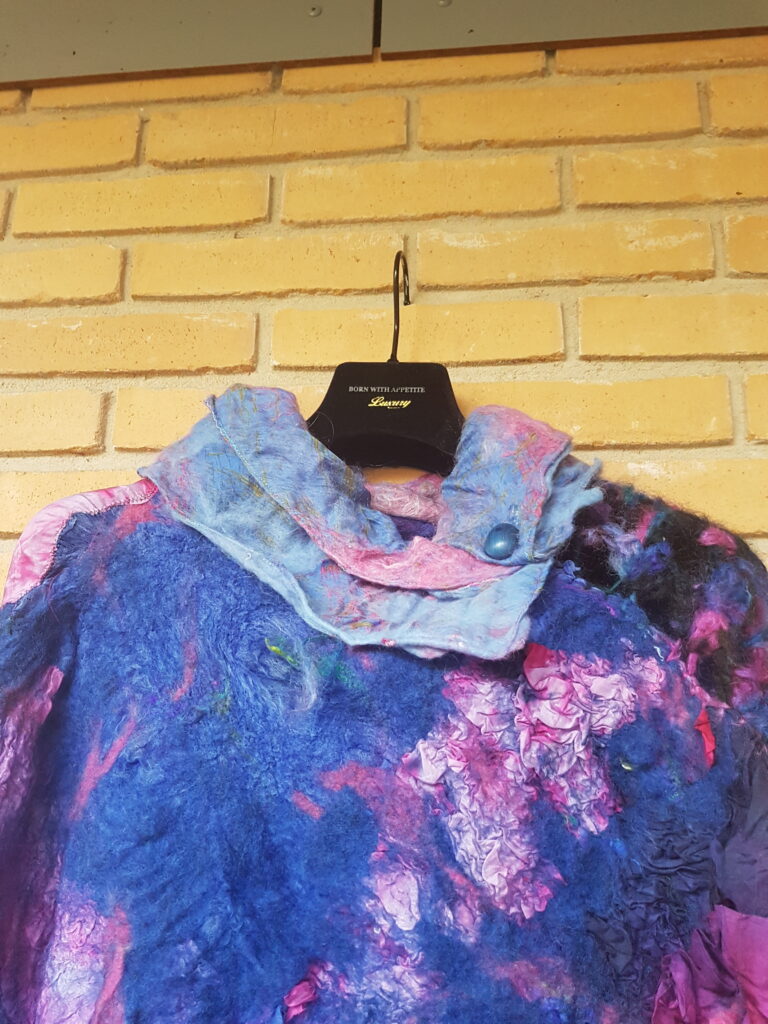 poncho blauw roze