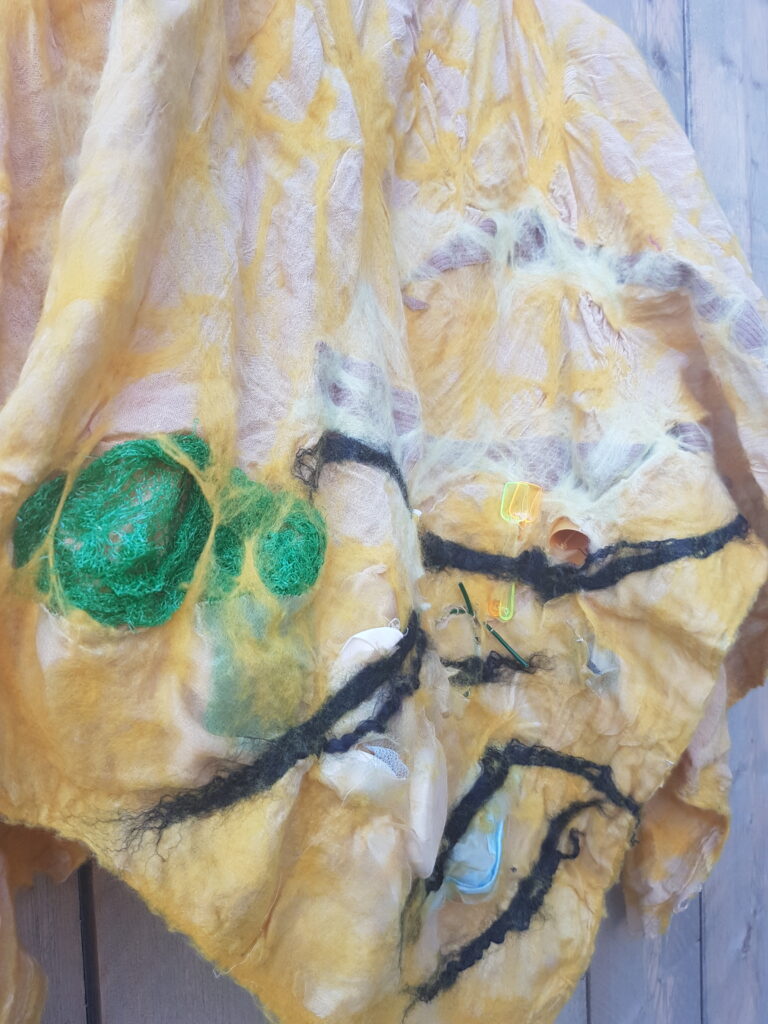 poncho vloedlijn