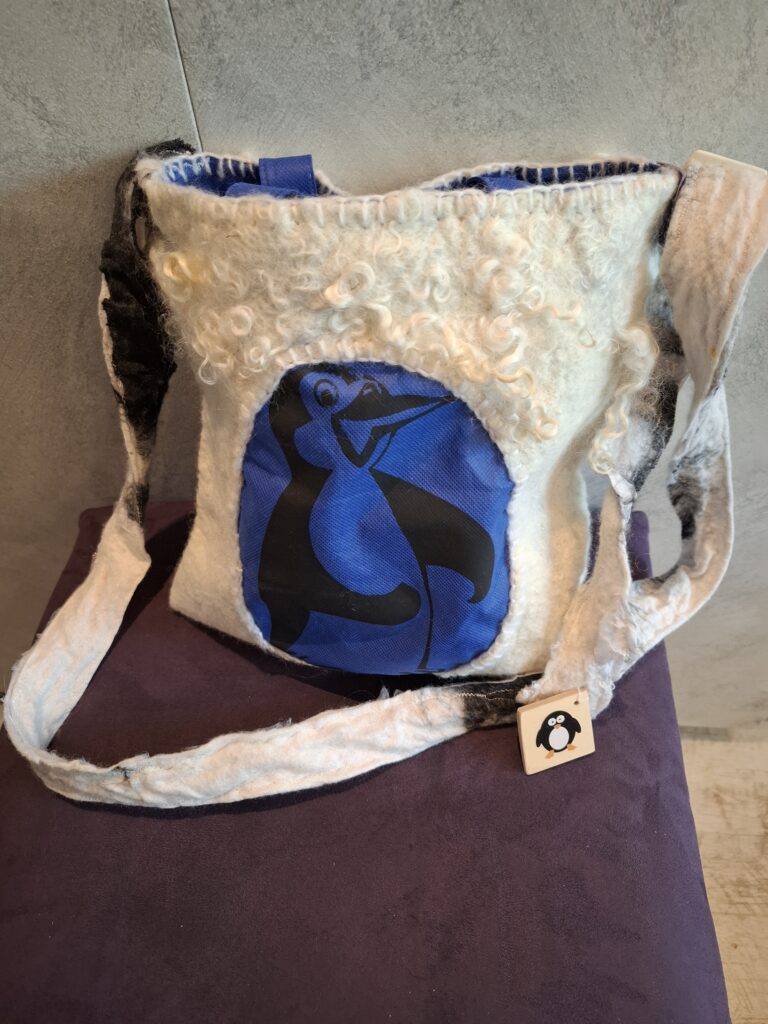 poncho tasje